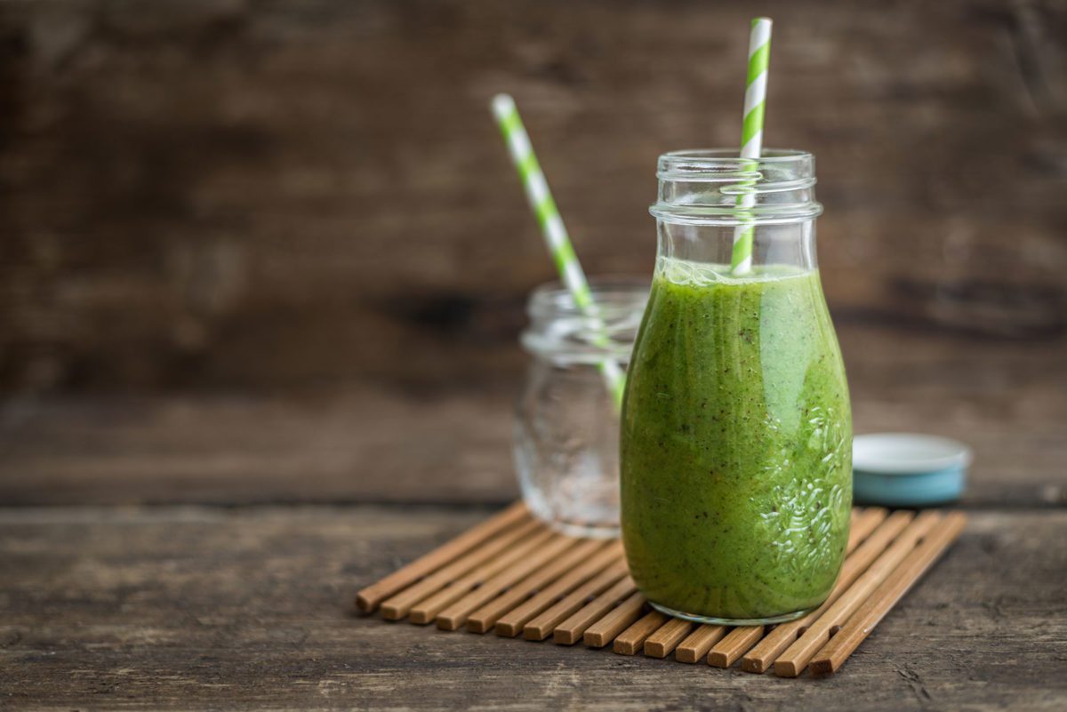 Healthy green smoothie in a mason jar